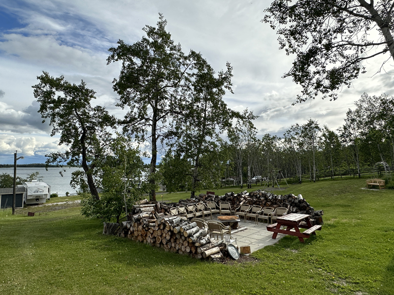 Communal fire pit and firewood.